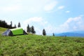 Small camping tent in mountains Royalty Free Stock Photo