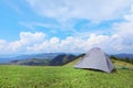 Small camping tent in mountains Royalty Free Stock Photo