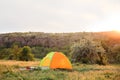 Small camping tent in wilderness Royalty Free Stock Photo