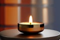 Small candle with a soft bokeh background