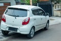 A small car is parked with defocused background