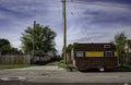 Small caravan house parked on the road in a rural area Royalty Free Stock Photo