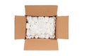 Small cardboard box with packing foam pellets Royalty Free Stock Photo
