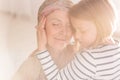 Small caring child embracing mother Royalty Free Stock Photo