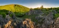 Small Carpathian country with rocks and green forest