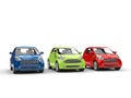 Small cars in a row - Red, Green and Blue Royalty Free Stock Photo