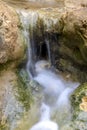 Small cascades of waterfalls on a mountain stream in the spring. Parod River. Israel Royalty Free Stock Photo