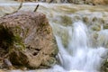 Small cascades of waterfalls on a mountain stream in the spring. Parod River. Israel Royalty Free Stock Photo