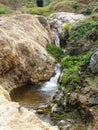 California Coastal Rocks and Cliffs, small cascading waterfall along the coast - Road Trip down Highway 1 Royalty Free Stock Photo