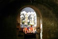 A small catholic chapel inside. Virgin Mary, candles, thanks