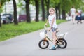 Small Caucasian girl riding a bicycle