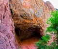 Small Cave Formed In The Red Limestone Walls of Condor Canyon