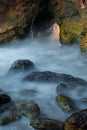 Small cave at sea shore background Royalty Free Stock Photo