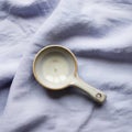 A small ceramic measuring spoon with Royalty Free Stock Photo