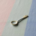 A small ceramic spoon with a Royalty Free Stock Photo