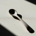 Small, ceramic spoon with a smooth, Royalty Free Stock Photo
