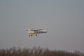 Small Cessna plane landing