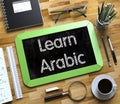 Learn Arabic - Text on Small Chalkboard. 3d Royalty Free Stock Photo