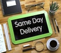 Small Chalkboard with Same Day Delivery. Royalty Free Stock Photo