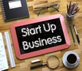 Small Chalkboard with Start Up Business Concept. 3D. Royalty Free Stock Photo
