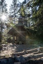 Small chapel in the forest in germany bavarian forest - Osserkapelle on the Osser. With heavy lensflare.