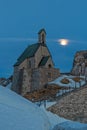 Small chapel on the summit of Wendelstein mountain at full moon Royalty Free Stock Photo