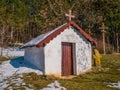 Small Chapel or tabernacle in the woods. Royalty Free Stock Photo