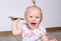 Baby girl playing with a mobile phone. Royalty Free Stock Photo