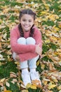 Small child with autumn leaves. Happy little girl in autumn forest. Autumn leaves and nature. Happy childhood. School Royalty Free Stock Photo