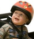 The small child in a bicycle helmet.