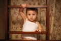 Small child boldly climbing the stairs Royalty Free Stock Photo