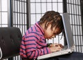 Small child with a computer