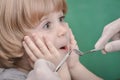 Small child and dental instrument