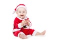 Small child dressed as Santa Claus