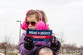 Small Child Holds up Ohians for Gun Safety Sign at March For Our Lives in Columbus Ohio