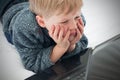 Small child looking at online web pages Royalty Free Stock Photo