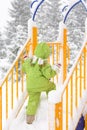 Small child playing with first snow Royalty Free Stock Photo