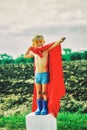 A small child plays a superhero. Royalty Free Stock Photo