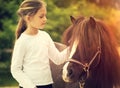 Small child and pony Royalty Free Stock Photo