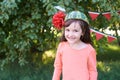 Small child. Pretty Girl. Watermelon on the head. Brightly color