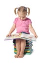 Small child reading a book Royalty Free Stock Photo