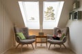 Small child reading a book under two skylights Royalty Free Stock Photo