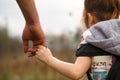 A small child`s hand in his father`s big palm. Royalty Free Stock Photo