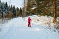Small child in the ski track at winter forest in Finland Royalty Free Stock Photo