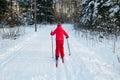 Small child in the ski track at winter forest in Finland Royalty Free Stock Photo