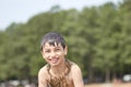 Small children bathe in water smear dirt on their body and rejoice Royalty Free Stock Photo
