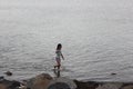 Small children playing on the beach