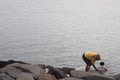 Small children playing on the beach