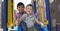 Small childs on slide. Royalty Free Stock Photo