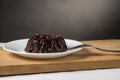 Small Chocolate Bunt cake with a fork Royalty Free Stock Photo